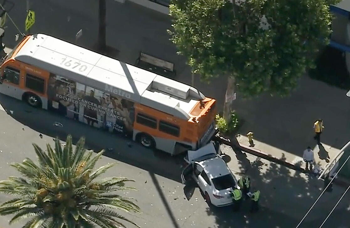 Six taken to the hospital after car crashes into Metro bus in Reseda