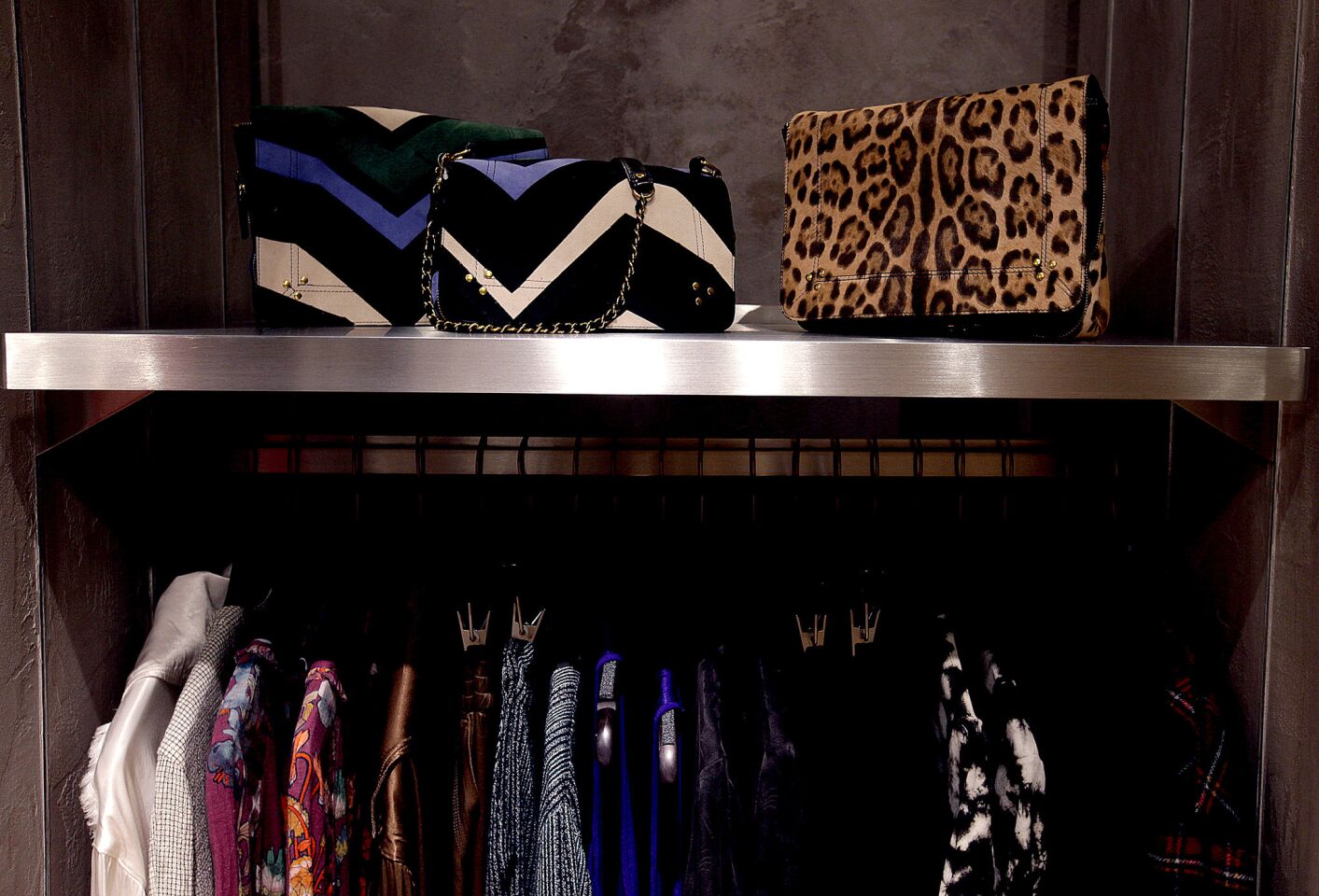 A look at handbags and a rack of clothes at Traffic Los Angeles.