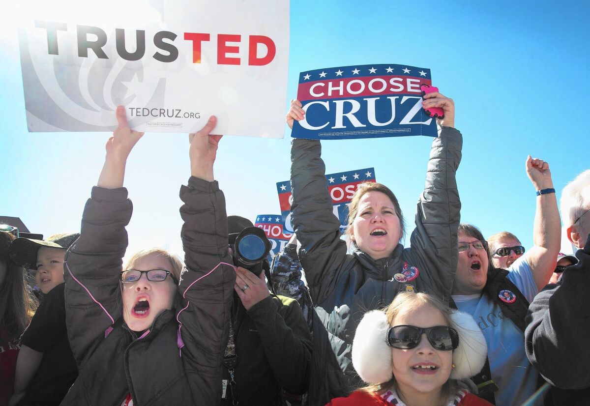 Supporters of Republican presidential candidate Ted Cruz rally in Atlanta.