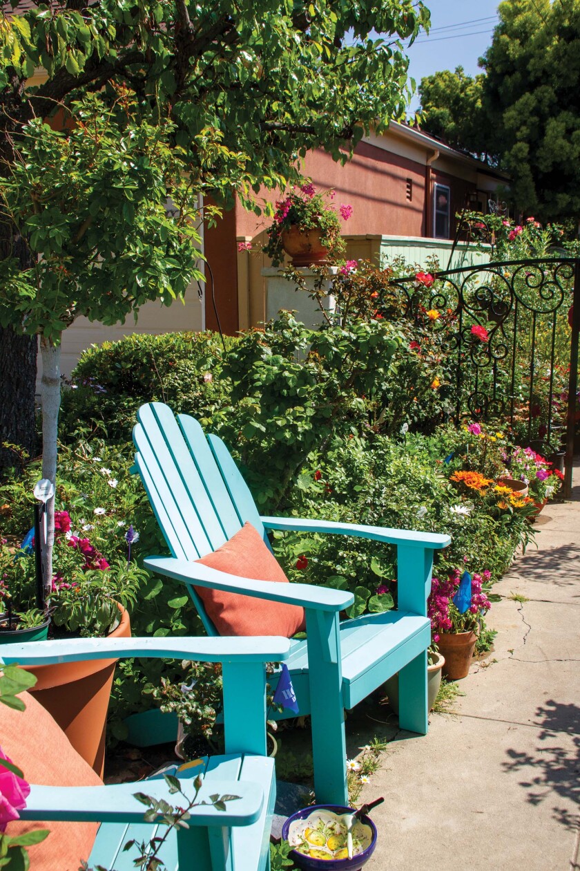 This rose garden gives the homeowner a place to sit and gather inspiration from the view.