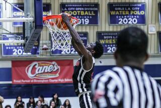Sergine Deme of Cleveland delivers a dunk in win over Birmingham.