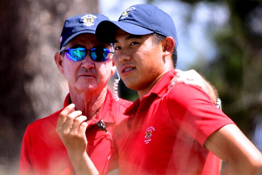 LOS ANGELES, CA - SEPTEMBER 09: Collin Morikawa of Team USA talks with Captain, Spider Miller, on the fourth tee in a two and three win over Paul McBride of Team Great Britain and Ireland during the singles matches in the 2017 Walker Cup at the Los Angeles Country Club on September 9, 2017 in Los Angeles, California. (Photo by Harry How/Getty Images) ** OUTS - ELSENT, FPG, CM - OUTS * NM, PH, VA if sourced by CT, LA or MoD **