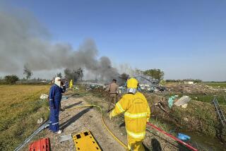 Firefighters work on a cite of an explosion at a firework factory in Suphan Buri province, Thailand, Wednesday, Jan. 17, 2024. The Thai government’s disaster relief agency says an explosion at a fireworks factory in central Thailand has killed at least 20 people. (Samekan Suphan Buri Foundation via AP)