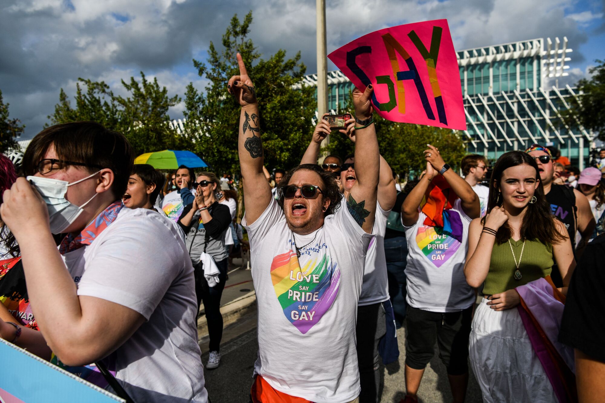 People protest against the "Don't Say Gay" bill in Florida.