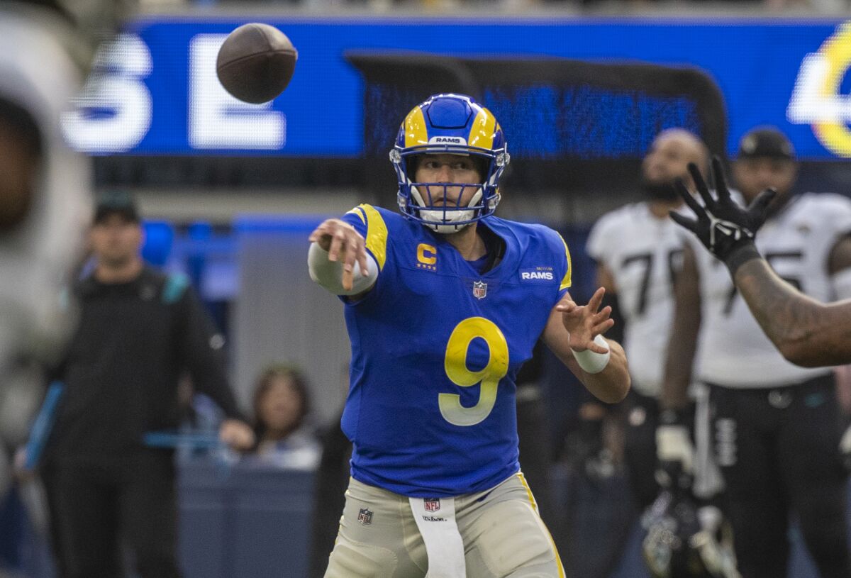 Rams quarterback Matthew Stafford passes during the second quarter of a 37-7 win.