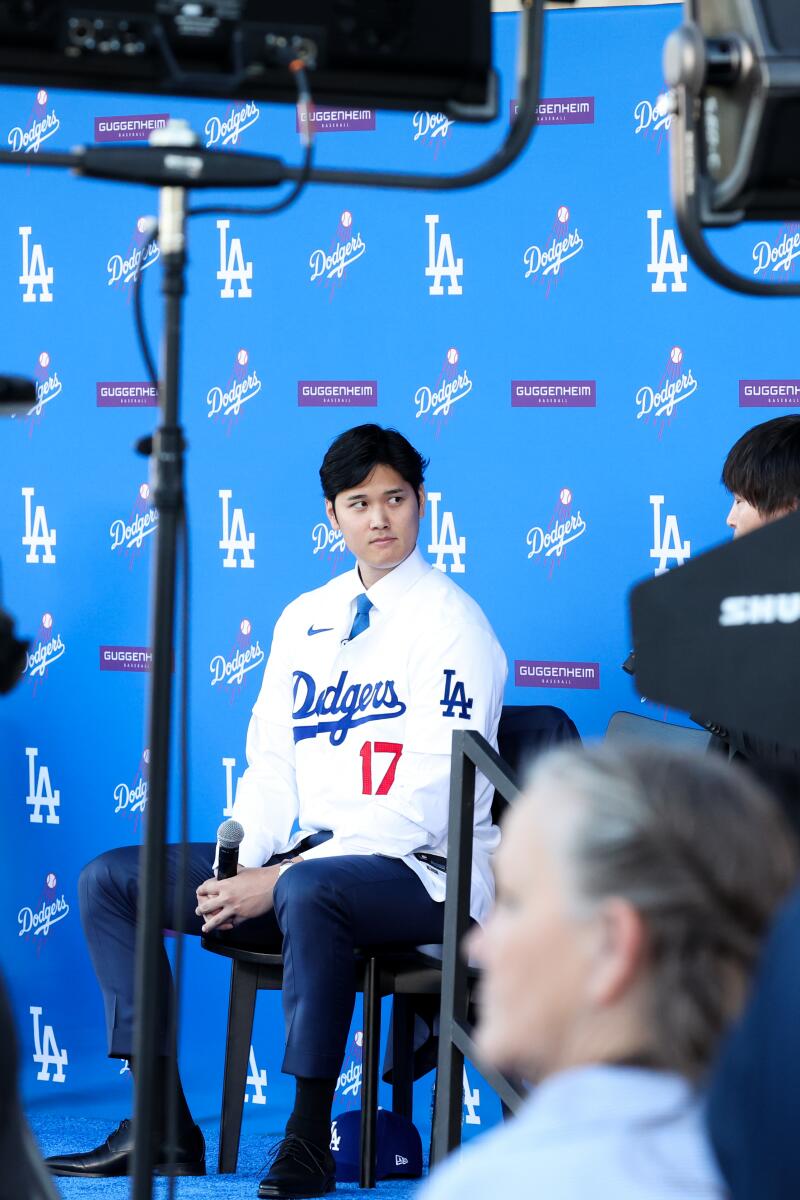 Shohei Ohtani prepares to speak at a press conference at Dodger Stadium on Dec. 14.