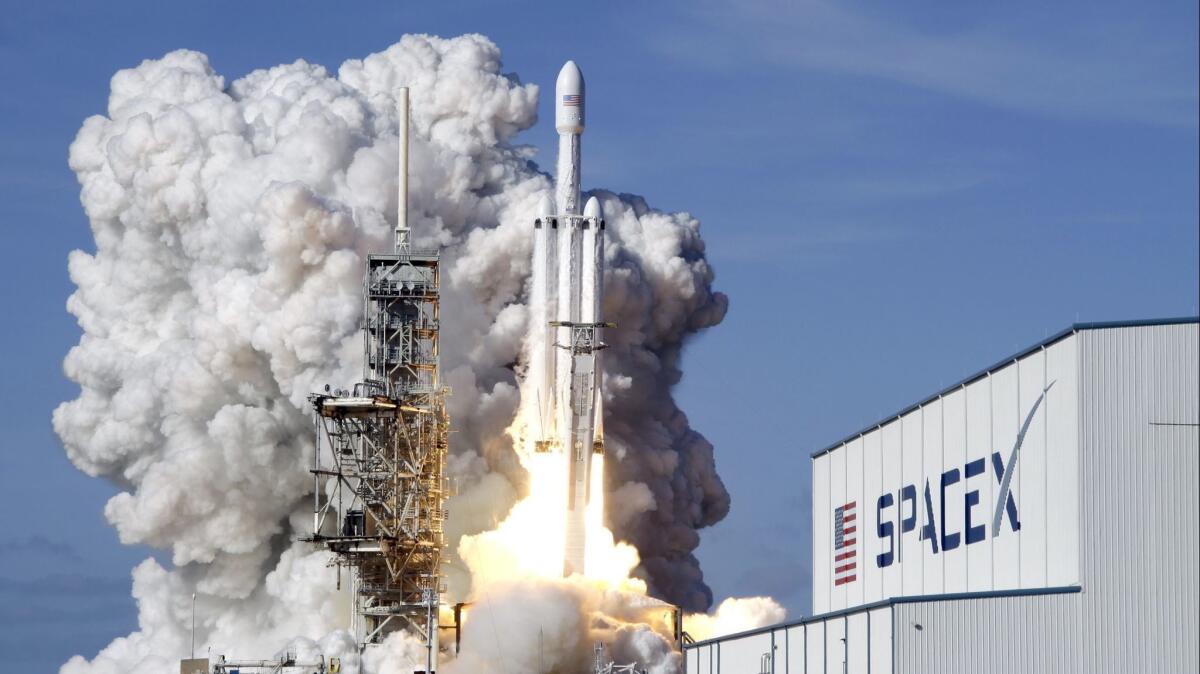 The first launch of a SpaceX Falcon Heavy rocket, in February from Cape Canaveral, Fla.