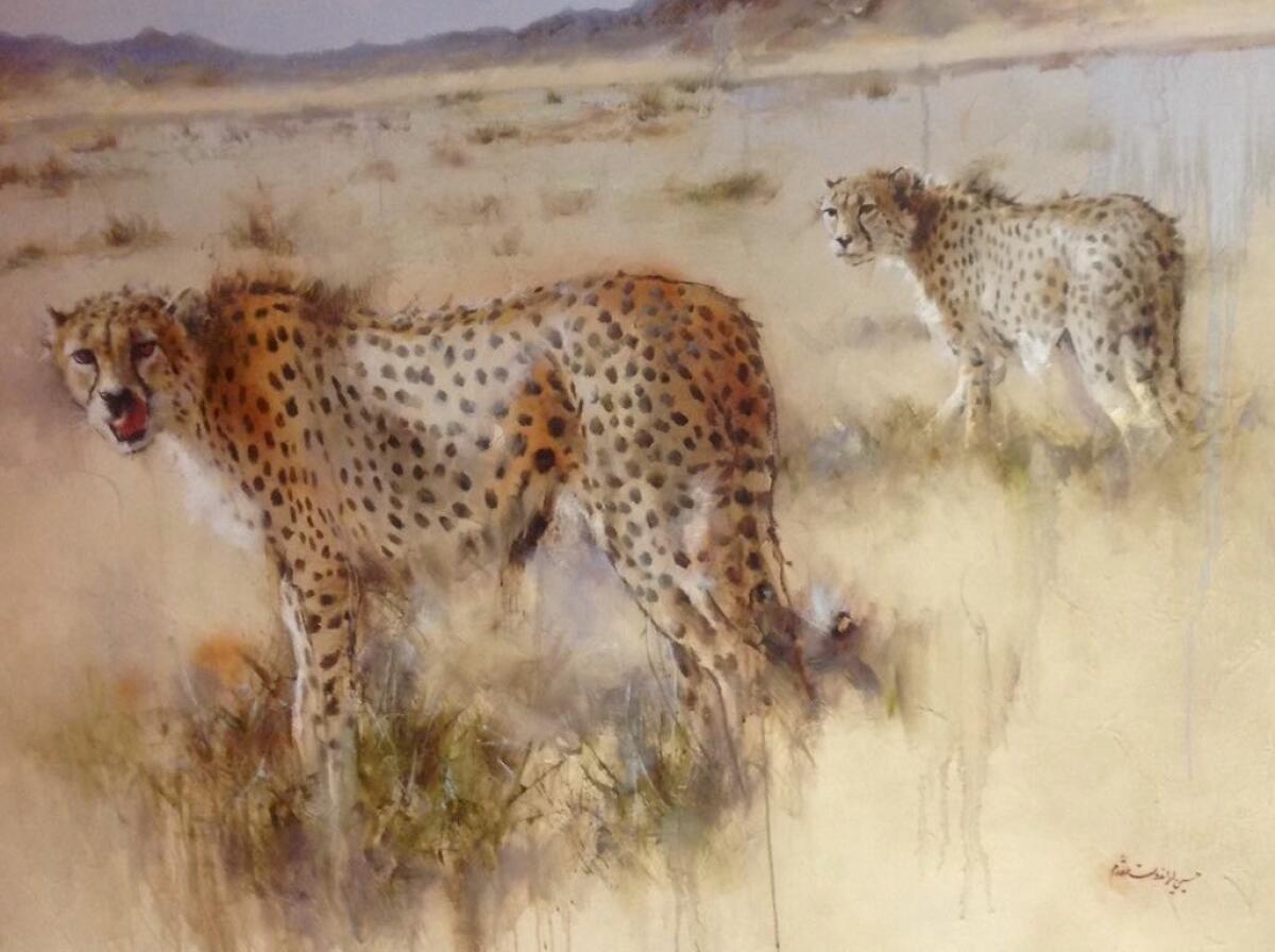 Two Asiatic cheetahs are depicted in this painting by Iranian artist Hossain Irandoust Moghaddam, which hangs in the offices of the national environment agency.