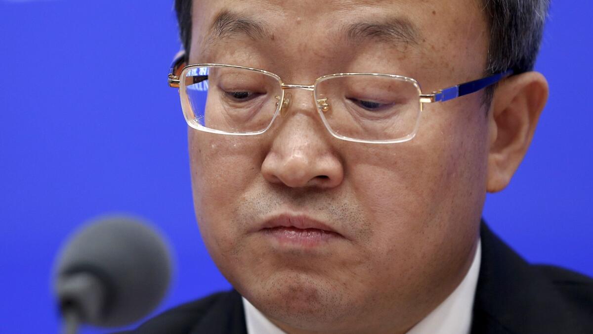 Trade negotiator Wang Shouwen, shown at a Beijing news conference earlier in the month, said on June 24, 2019, that both the U.S. and China must make concessions.