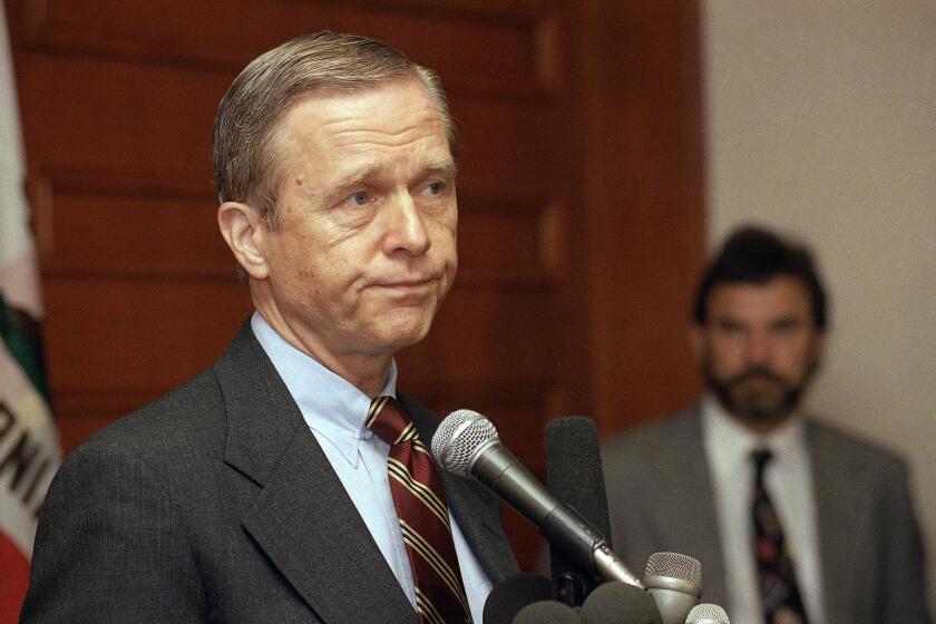 California Gov. Pete Wilson listens to a question at morning-after Election Day news conference in the Century City section of Los Angeles, Nov. 4, 1992. Wilson authored the welfare and budget initiative which was defeated, chaired President Bush's losing California campaign and appointed John Seymour to the Senate. Seymour was defeated by Dianne Feinstein. (AP Photo/Kevork Djansezian)