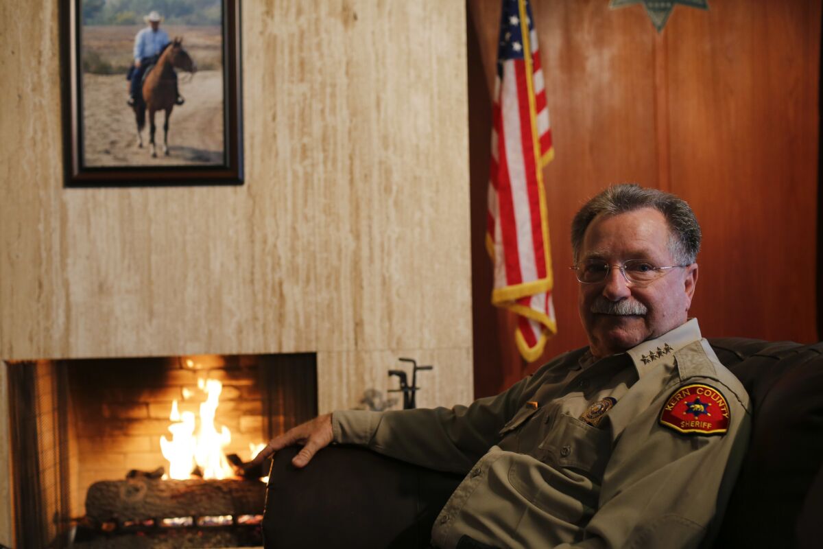 Kern County Sheriff Donny Youngblood, shown here in his office, wants the county to be a "law and order" county and is asking county supervisors to declare Kern a "non-sanctuary" county.