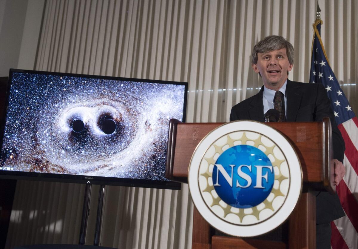 David Reitze, the executive director of the LIGO laboratory at Caltech, announces in Washington, D.C. on Feb. 11 that for the first time scientists have observed ripples in the fabric of space-time called gravitational waves.
