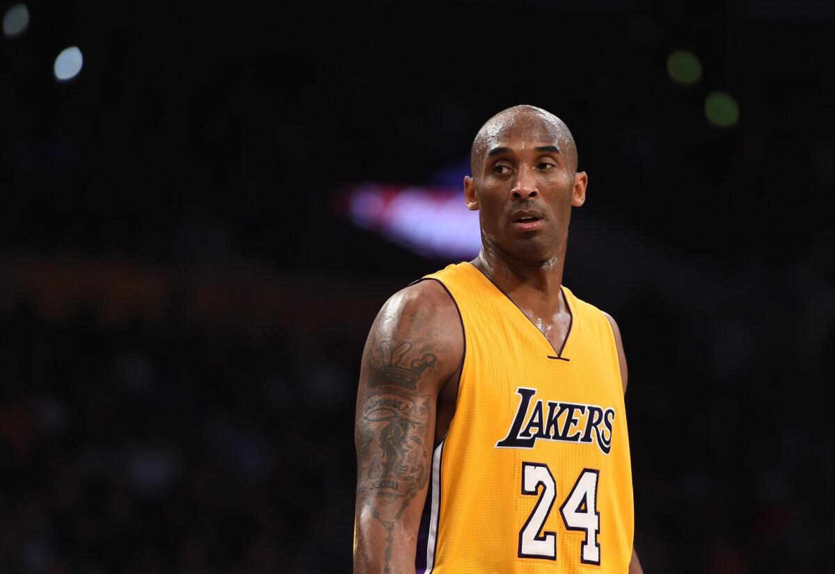 Lakers star Kobe Bryant, shown at a Nov. 20 game against the Toronto Raptors at Staples Center, announced Sunday that he will be retiring at the end of the 2015-16 season.