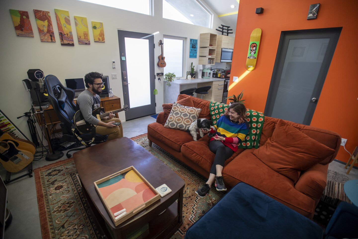 The couple relax in their living room.