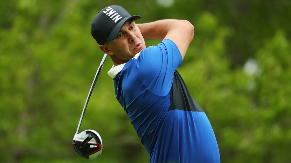 Brooks Koepka plays a shot from the 16th tee during the final round of the 2019 PGA Championship. Koepka won the PGA Championship for the second straight year.