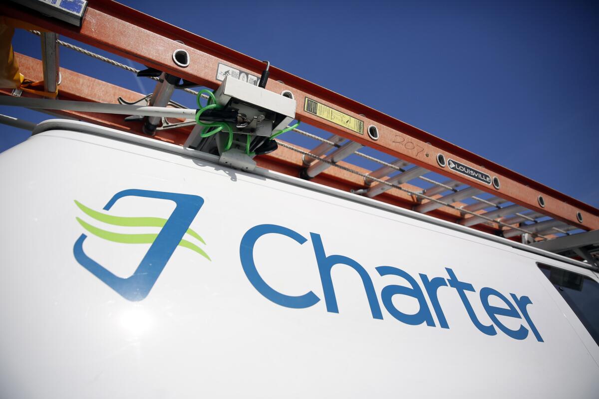 California regulators approve Charter Communication's request to take over Time Warner Cable and Bright House Networks, which will make Charter the dominant Internet service and pay-TV company in Southern California with more than 2 million customers.