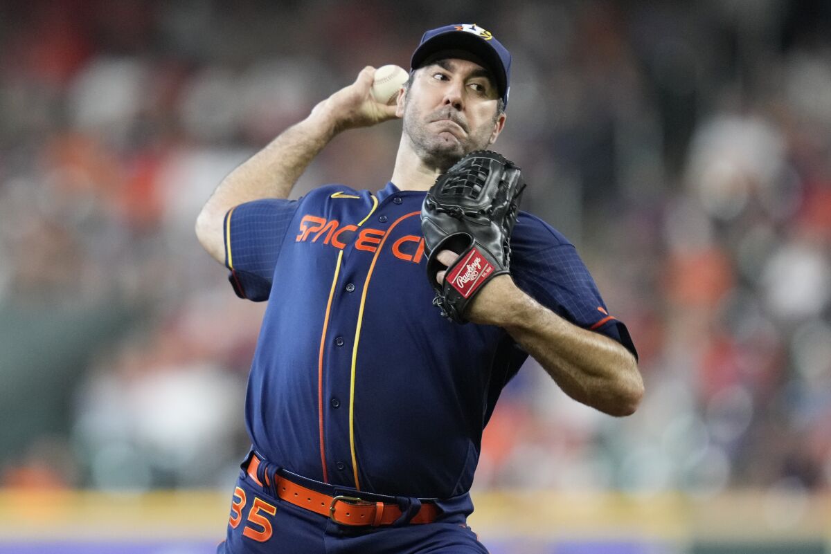 Houston Astros starting pitcher Justin Verlander delivers during the first inning of a baseball game against the Oakland Athletics, Saturday, July 16, 2022, in Houston. (AP Photo/Eric Christian Smith)