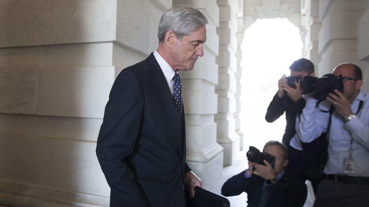 Special counsel Robert S. Mueller III leaves after briefing members of the Senate Judiciary Committee on June 21 on the investigation into Russia's interference in the 2016 election.