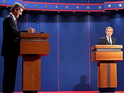 President George W. Bush and his Democratic opponent Sen. John Kerry as the debate begins.