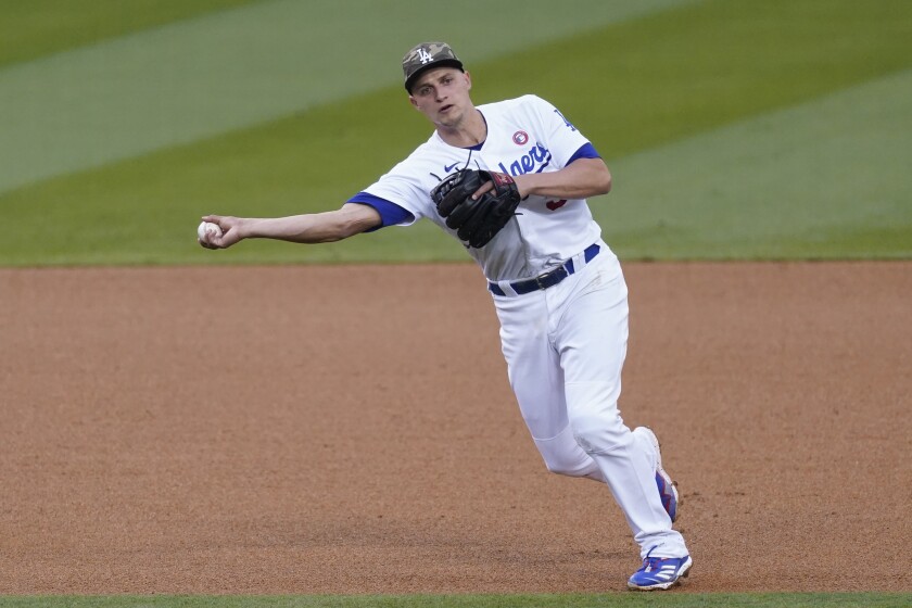 Dodgers shortstop Corey Seager throws to first during a game against the Miami Marlins on May 15 at Dodger Stadium.