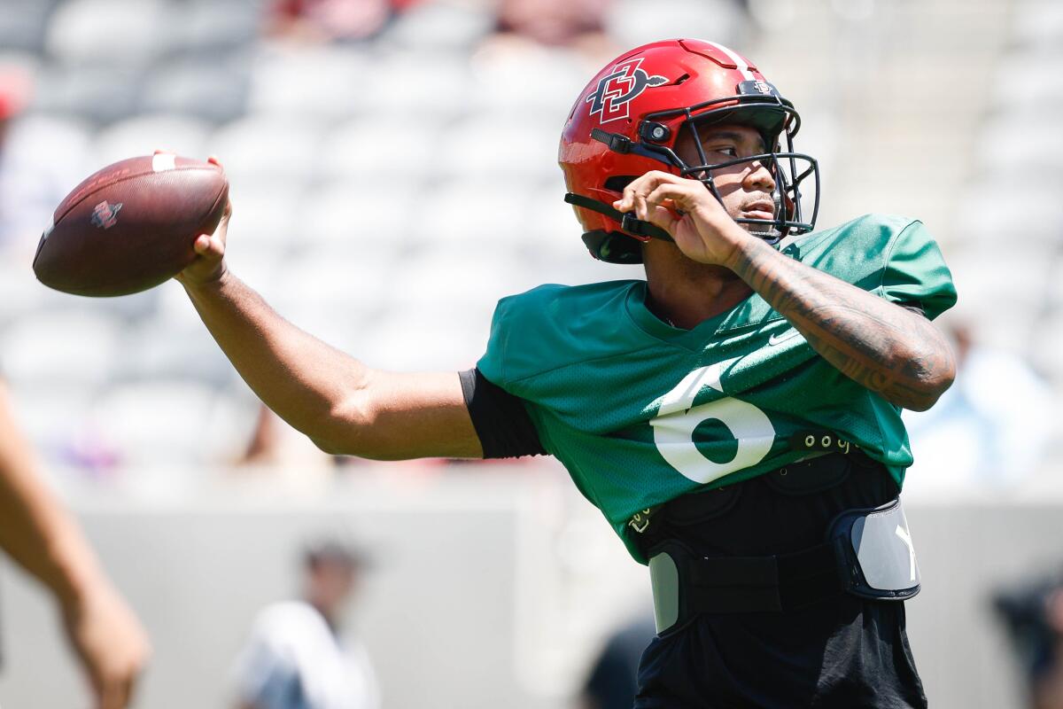 San Diego State redshirt freshman quarterback Javance Tupou'ata-Johnson passes during scrimmage at Snapdragon Stadium.
