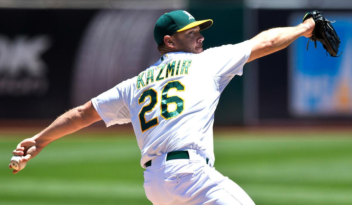 Oakland Athletics pitcher Scott Kazmir pitches against the Los Angeles Angels of Anaheim during the first inning on Sunday.