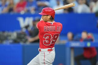 TORONTO, ON - AUGUST 26: Ryan Aguilar #39 of the Los Angeles Angels swings against the Toronto Blue Jays.