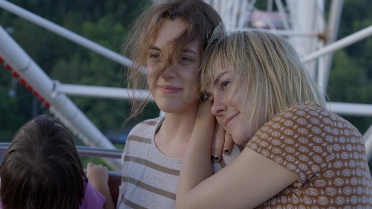 Jena Malone, as Mindy and Riley Keough, as Sarah in "Lovesong."