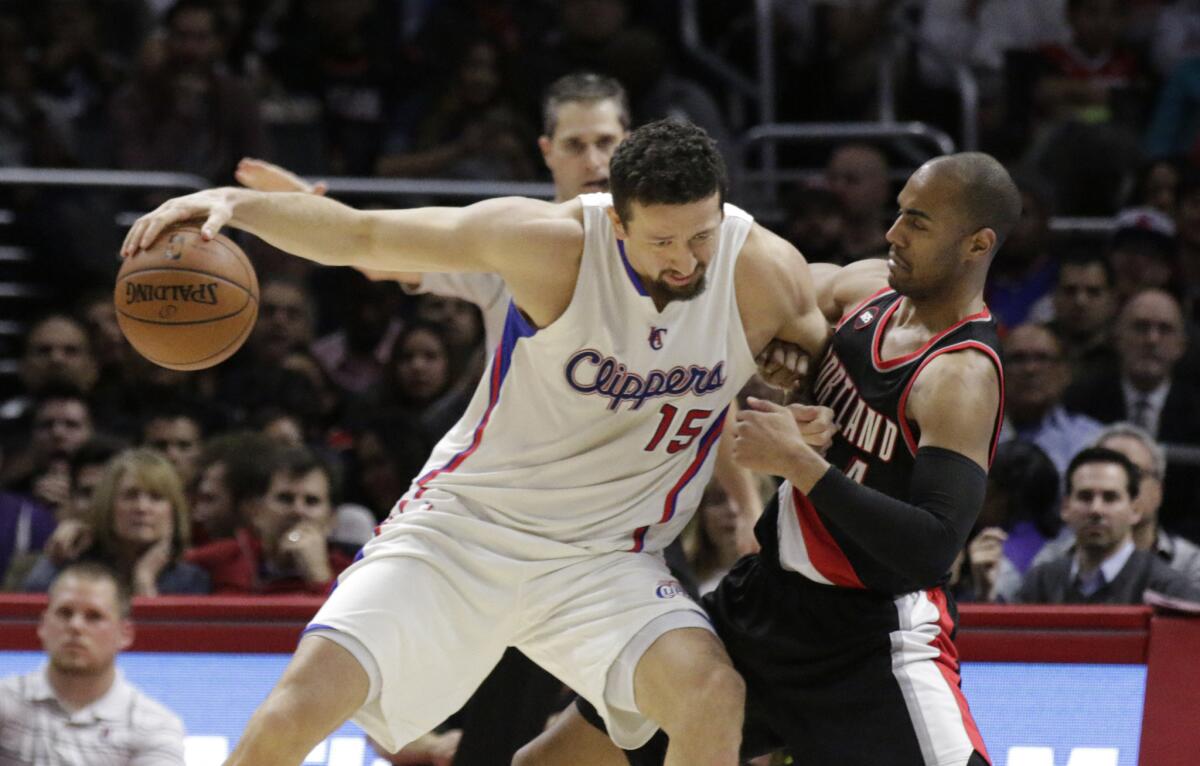 Clippers forward Hedo Turkoglu tries to back down Trail Blazers guard Arron Afflalo in the second half.