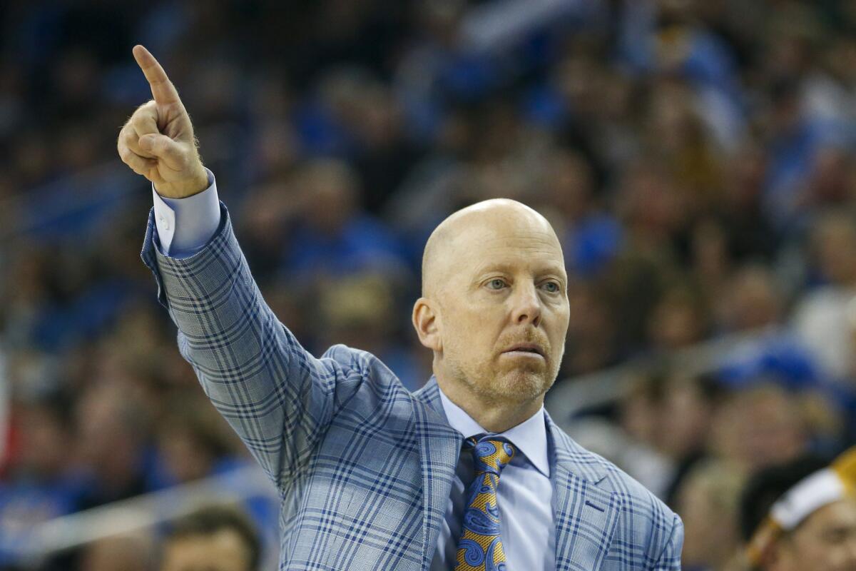 UCLA coach Mick Cronin directs his players during a win over Arizona on Saturday.