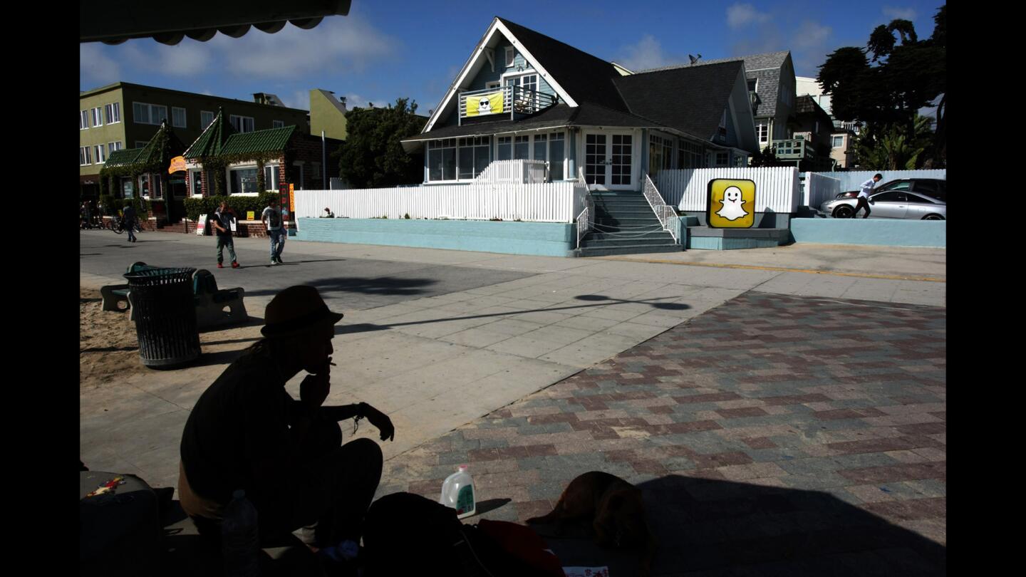 Even after Snapchat outgrew its original home in a beachfront bungalow, above, Chief Executive Evan Spiegel kept the company in Venice. Snapchat's latest expansion will displace about three dozen tenants.