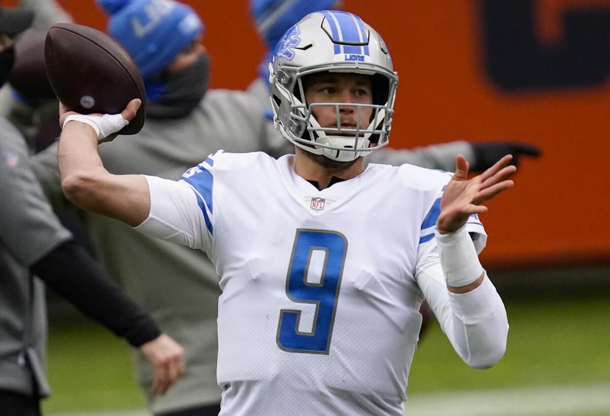 Detroit Lions quarterback Matthew Stafford warms up before a game against the Chicago Bears on Dec. 6, 2020.