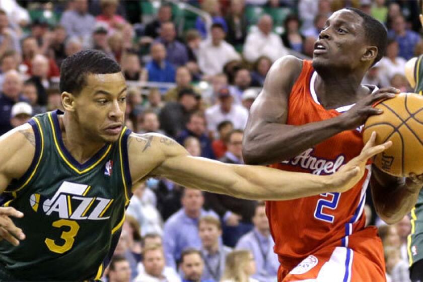 The Clippers' Darren Collison drives to the basket against Utah's Trey Burke on March 14.