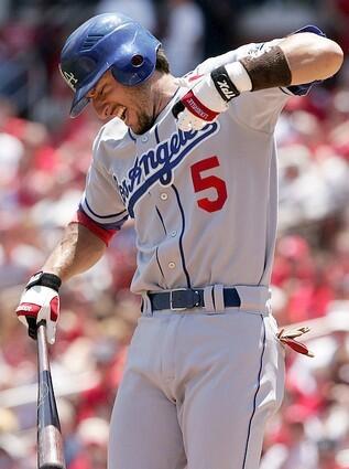 Nomar Garciaparra of the Los Angeles Dodgers reacts after he is hit by a pitch in the third inning.