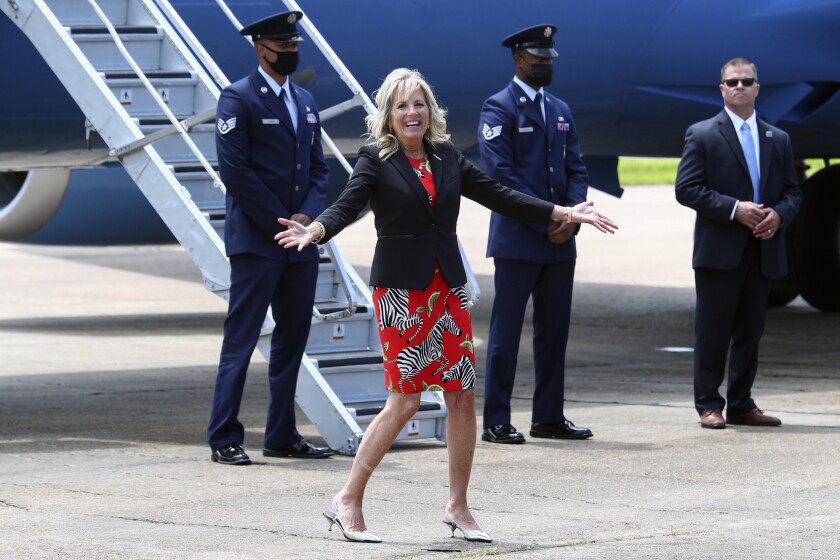 FILE - First lady Jill Biden reacts to a question from a reporter at Jackson-Medgar Wiley Evers International Airport, in Pearl, Miss., on June 22, 2021. (Tom Brenner/Pool Photo via AP, File)