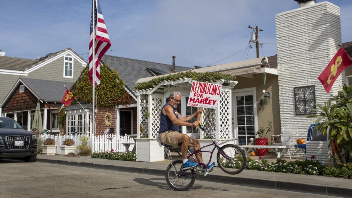 Balboa Island resident Dennis Bress, a Democrat who is volunteering with the Harley Rouda campaign, has been making and giving out "Republicans for Harley" signs in Newport Beach. He can't keep up with demand.