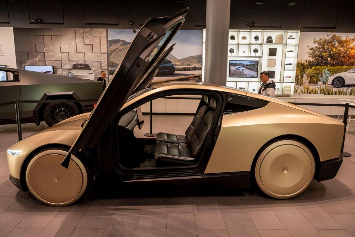 A Tesla Cybercab prototype at a Tesla store in San José, Calif.