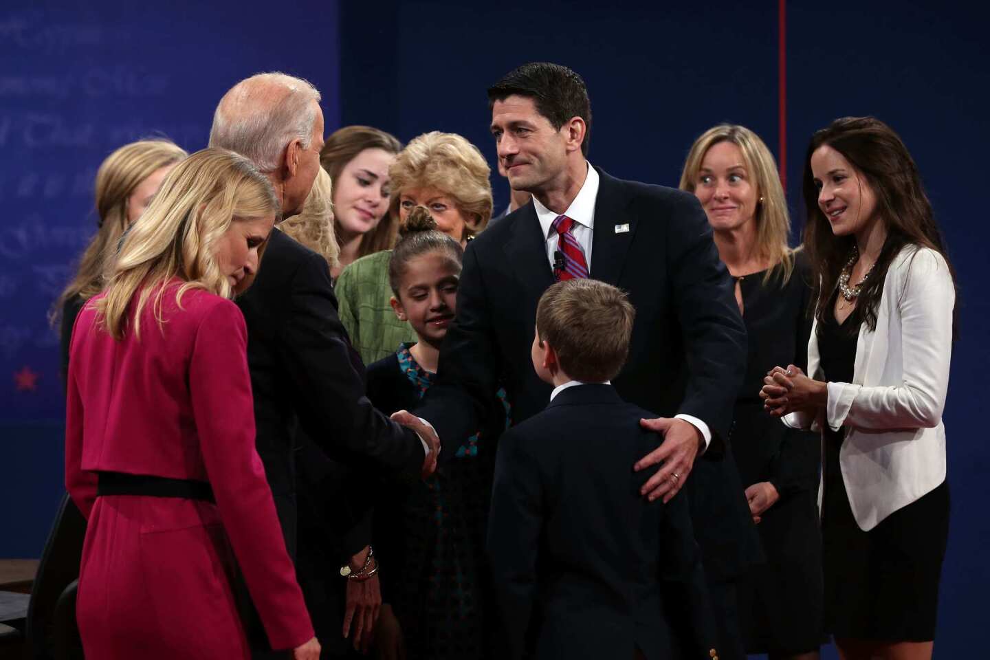 The Biden and Ryan families join the debaters onstage after the vice presidential showdown.