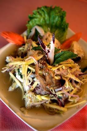 The raw blue crab salad comes with green papaya and lime, cooling and smacking hot at the same time, with that sea funk coming through the chile and lime.