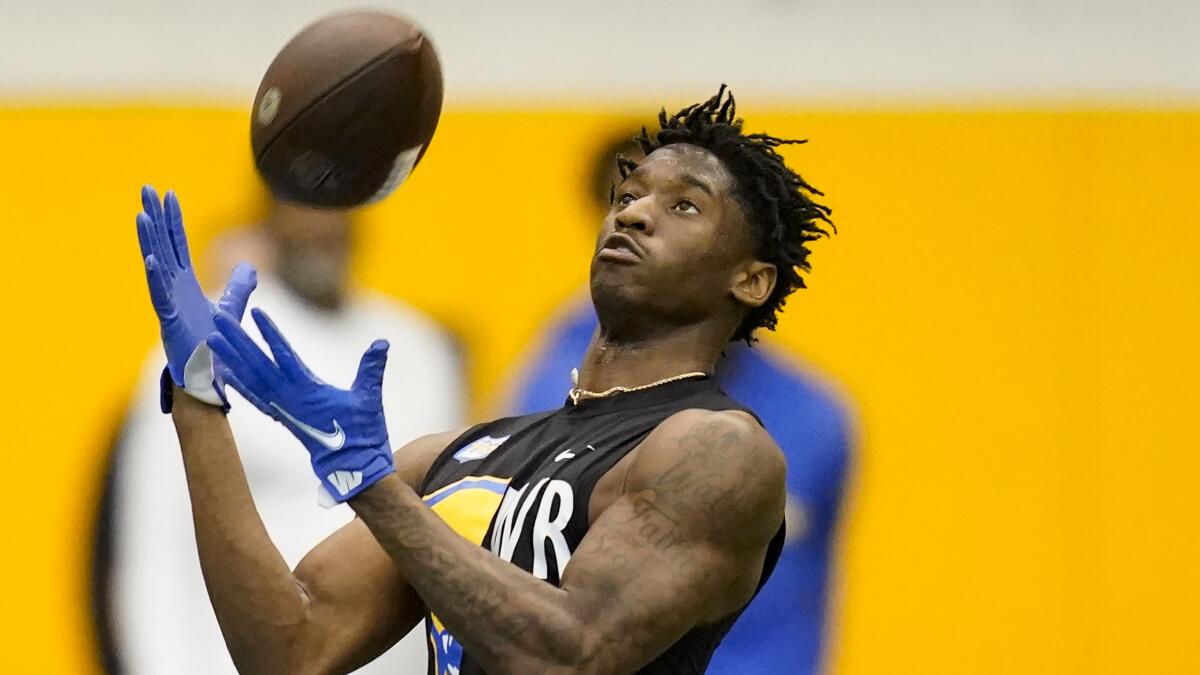 Pittsburgh wide receiver Jordan Addison catches the ball during Pittsburgh's football pro day