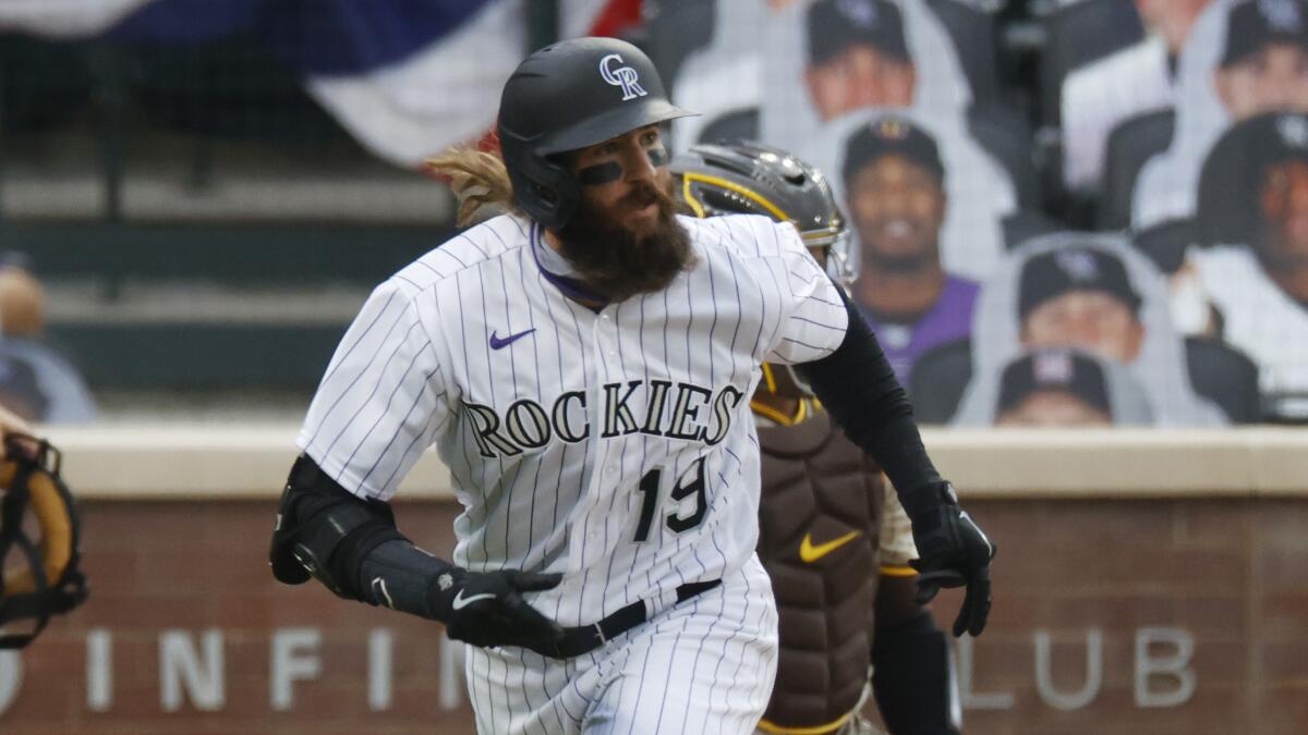 Colorado Rockies right fielder Charlie Blackmon hits the ball.