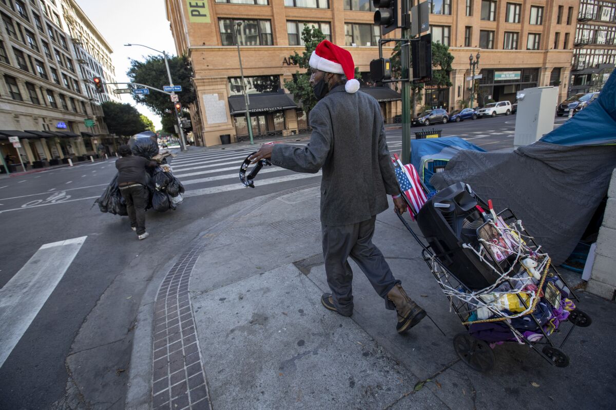 Steven Traylor walks home to the New Genesis Apartments, which provides permanent supportive housing to homeless people.