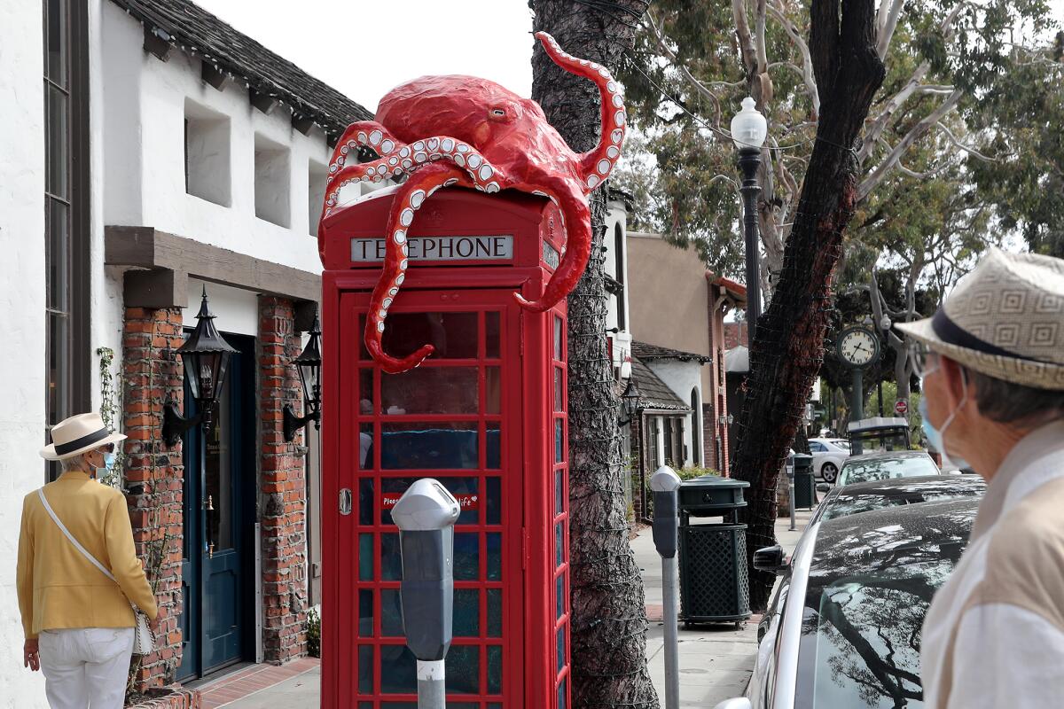 The Red Phone Booth installation called "Call to Action," created by artist Jeffrey Skarvan.