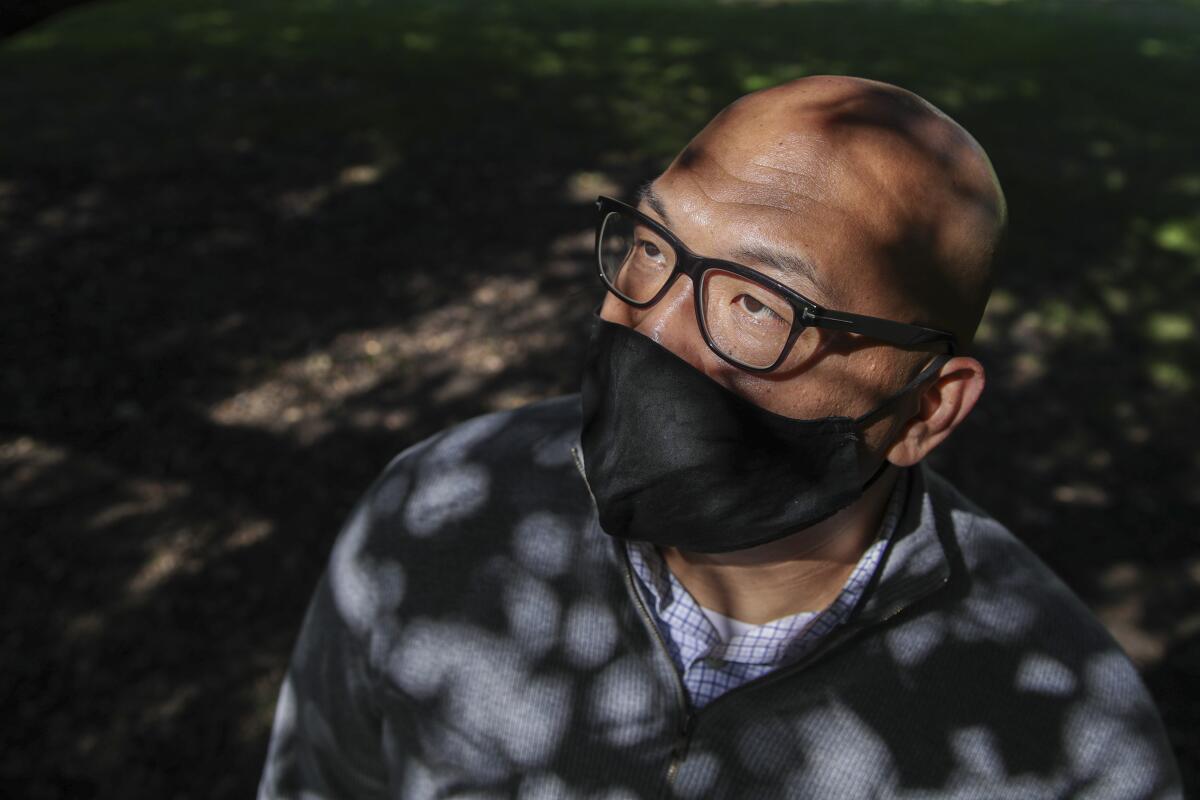 Chong Taing wearing a mask in Arcadia County Park