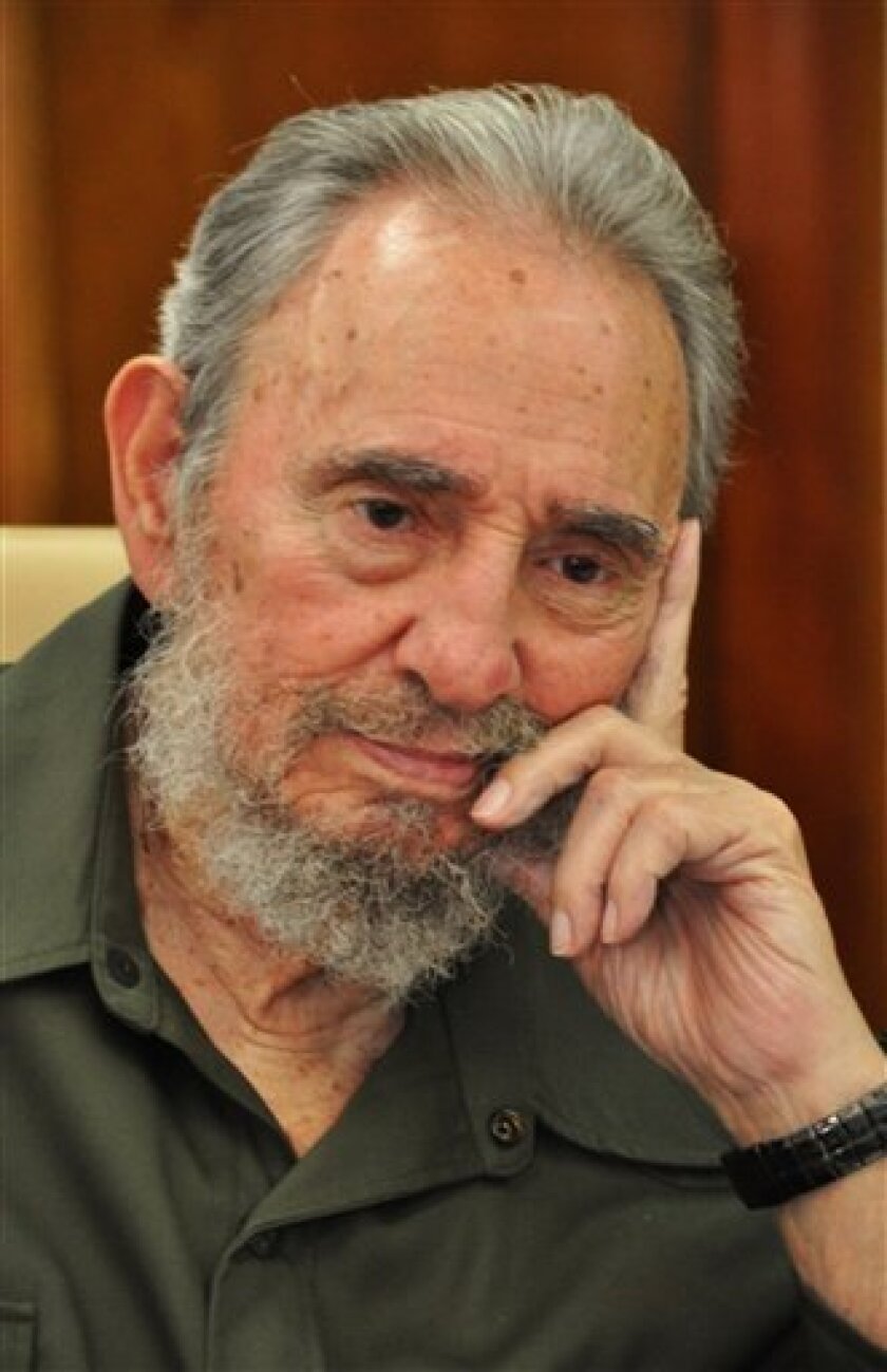 FILE - An Aug. 23, 2010 file photo provided by the state media Cubadebate web site shows Fidel Castro at a meeting with scientists in Havana, Cuba, Castro told a visiting American journalist that Cuba's communist economic model doesn't work. (AP Photo/Cubadebate/file)