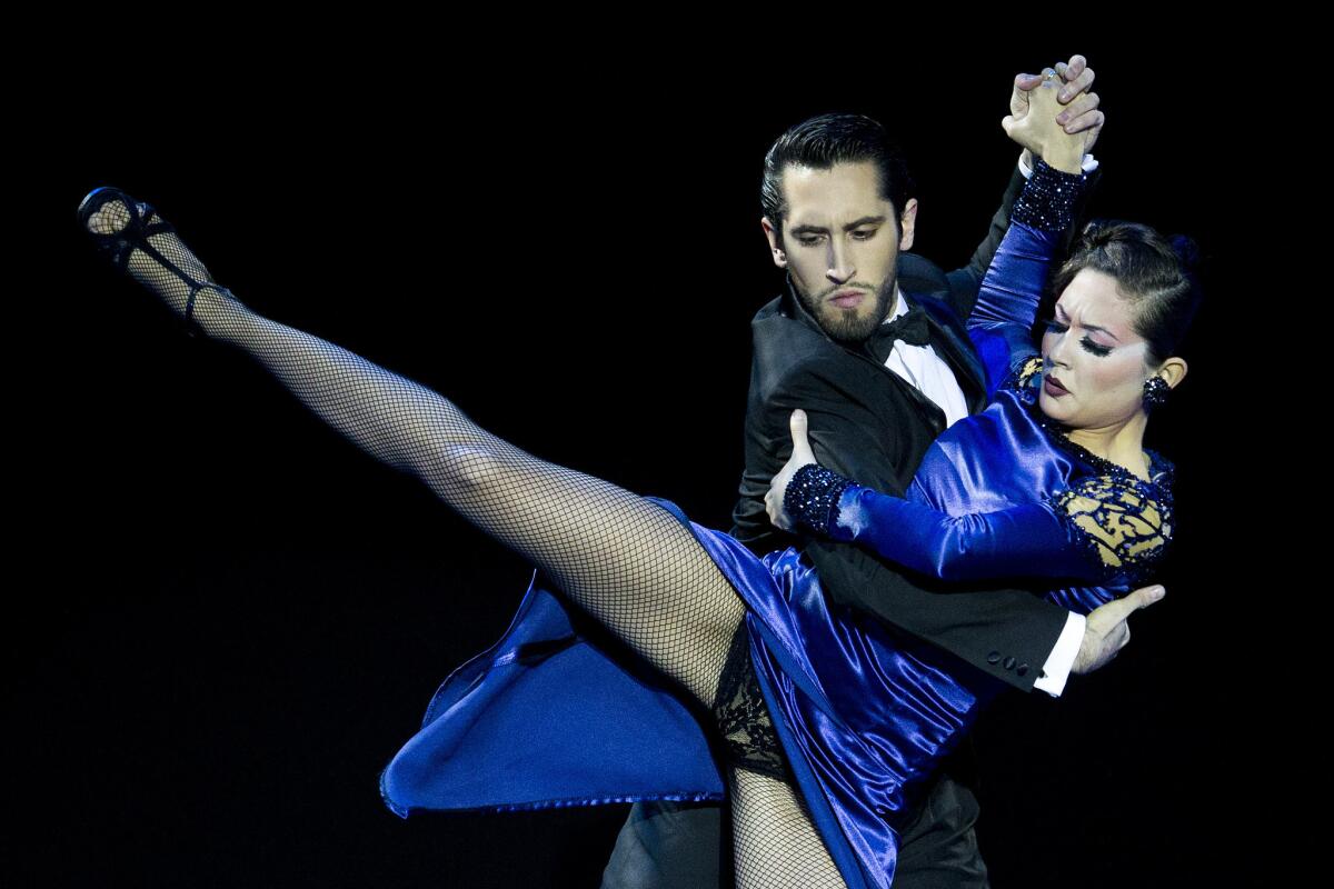 Nicolas Schell and Macarena Rosas perform the tango in Buenos Aires.