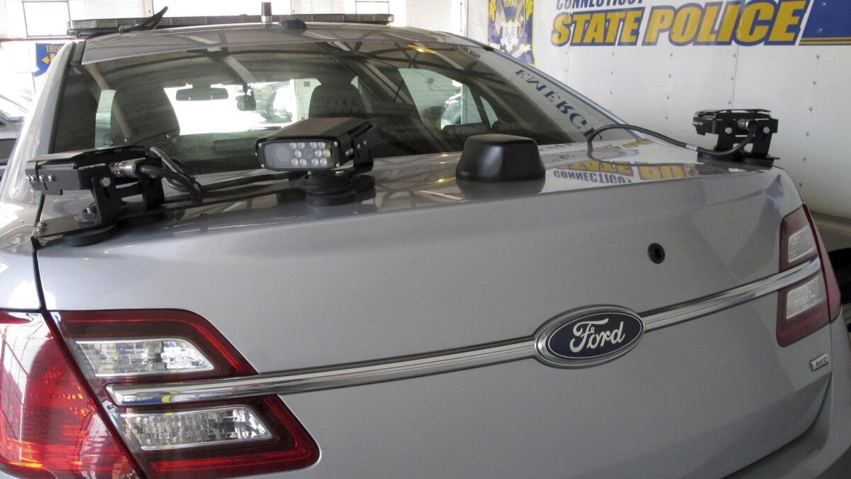 License plate reading cameras mounted on the back of a Connecticut State Police cruiser in Hartford, Conn.