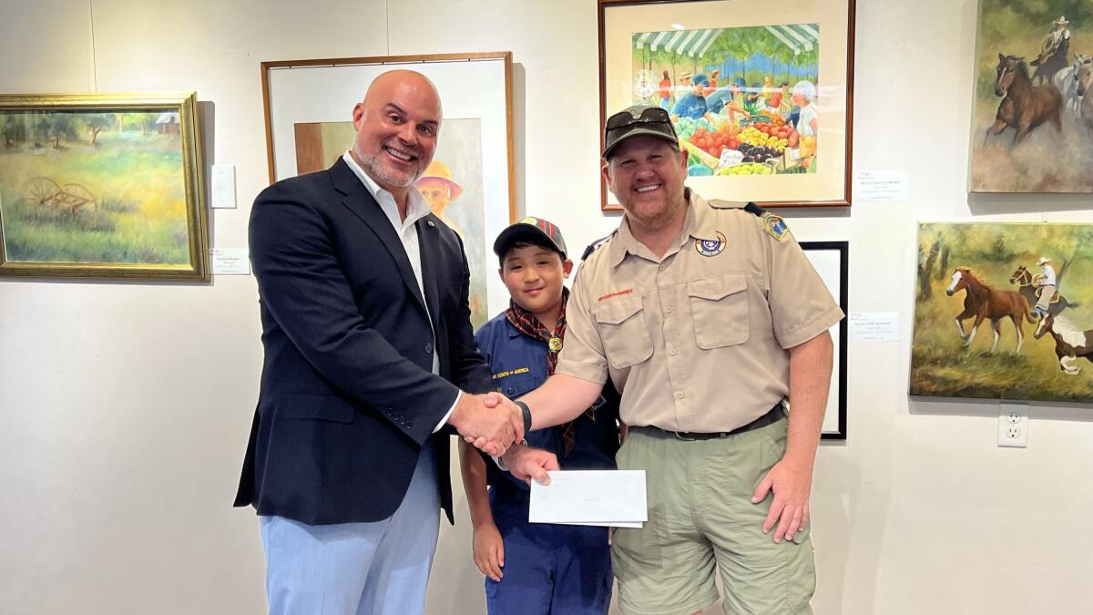 Kiwanis Club of La Jolla President Craig Gagliardi awards $5,000 to Cub Scout Troop 4.
