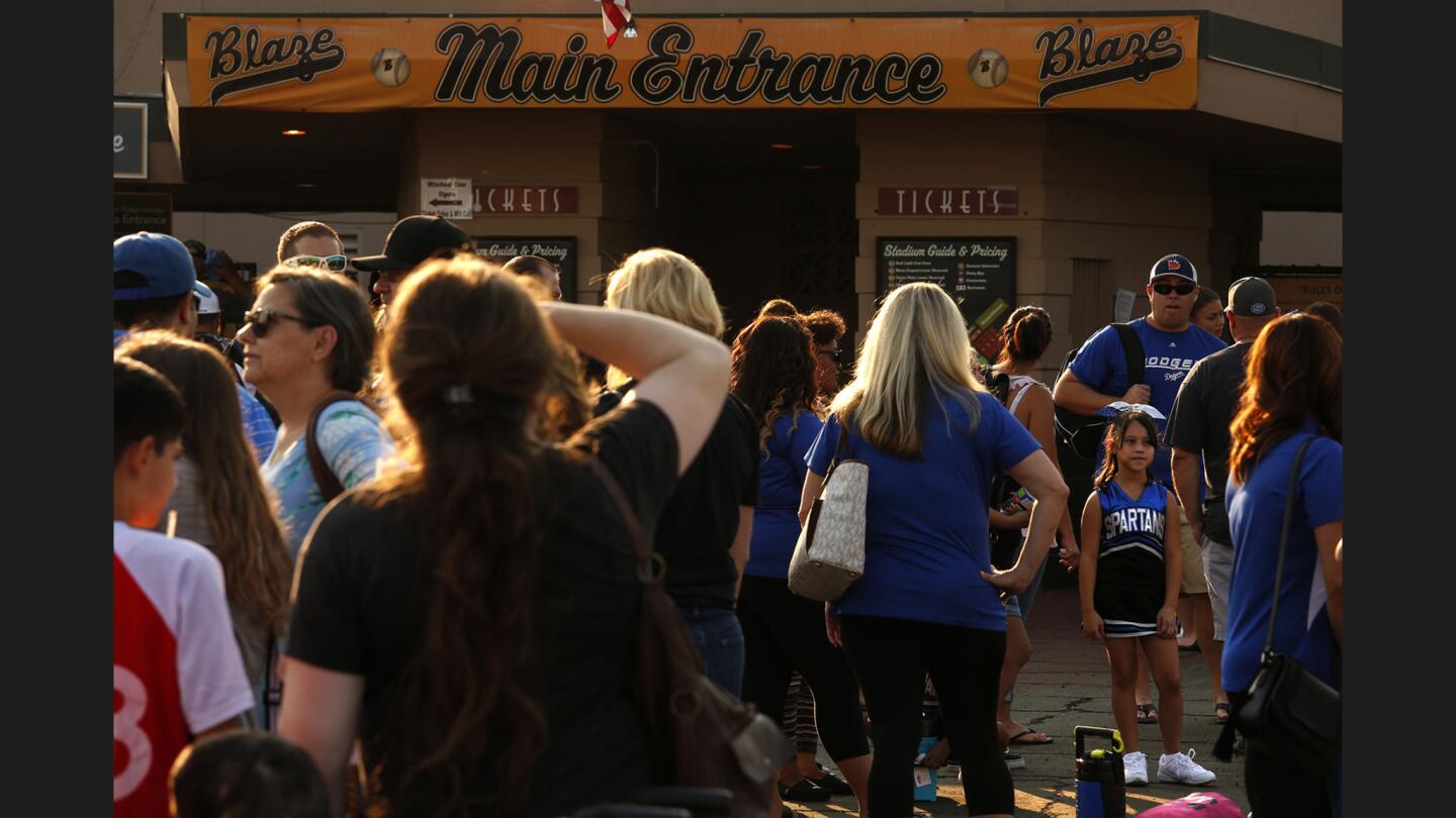 Fans wait to get into Sam Lynn Ballpark to attend one of the last games the Blaze will play in Bakersfield. Games often start around 8 p.m. during the longest days of summer because the batter's box faces into the setting sun.