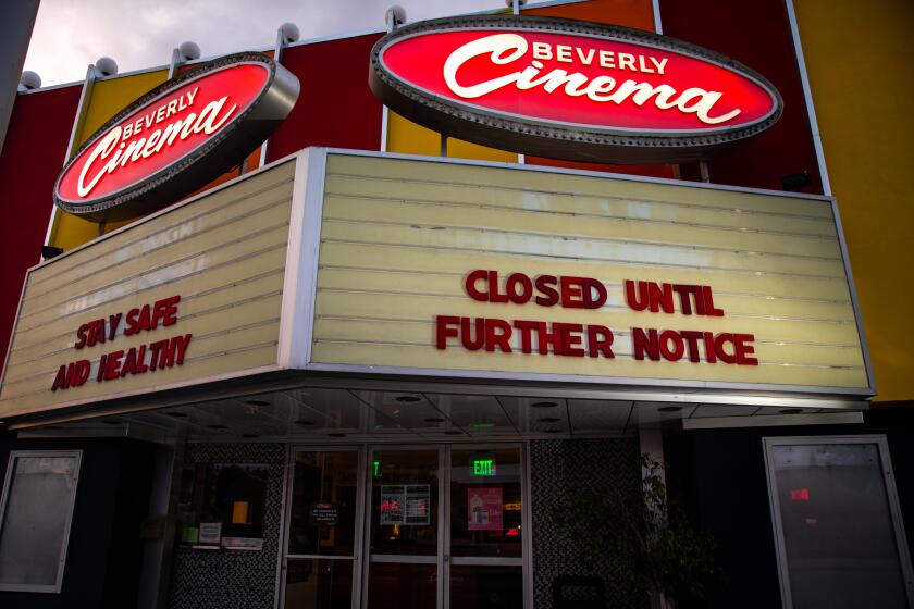 LOS ANGELES, CA - APRIL 19: The New Beverly Cinema in Los Angeles, CA, is closed and has darkened its marquee, but left the messages, "Stay Safe and Healthy," and "Closed Until Further Notice," during the coronavirus pandemic, photographed Sunday, April 19, 2020. The Beverly, owned by filmmaker Quentin Tarantino since 2007, is one of the oldest theaters in L.A., with the building dating back to the 1920s. (Jay L. Clendenin / Los Angeles Times)